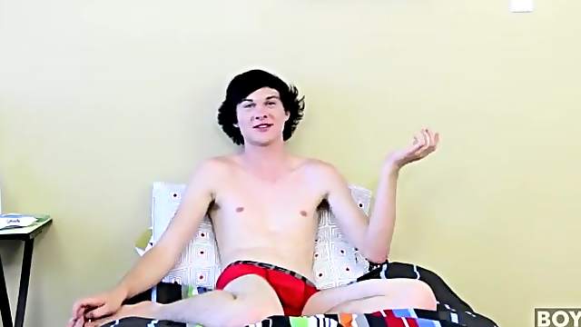 Smooth boy in his underwear chats to camera