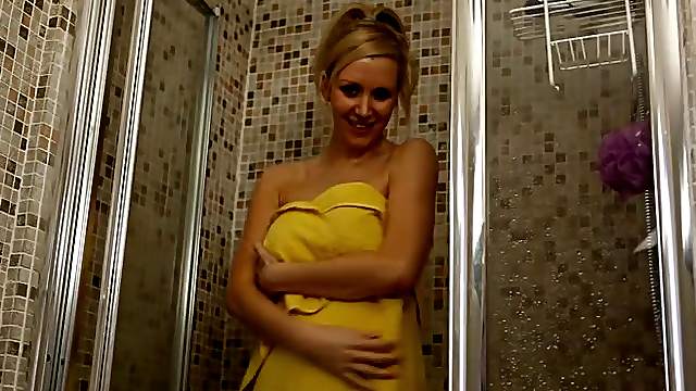 Slender beauty lets you jerk off to her in the shower