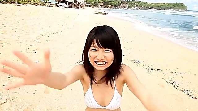 White bikini is a treat on this Japanese college girl