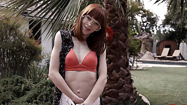 Redhead with nerdy glasses is all set to try her first black cock