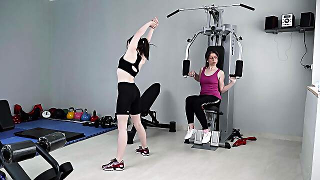 Seductive females share pure scissoring passion at the gym