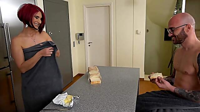 Elena Xacti rides a big cock in the kitchen, showcasing her juicy milf pussy in all its glory.