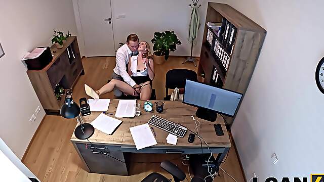 Andrea bends over for Stanley Johnson in a steamy office scene.