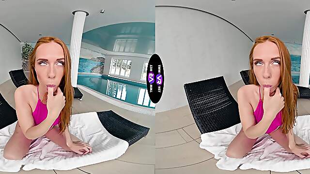 Redhead beauty Holly Molly wanking her pussy in the kitchen