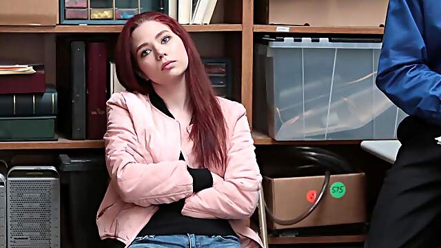 Redheaded vixen Cassidy Michaels gives Tommy Gunn a sloppy BJ in the office