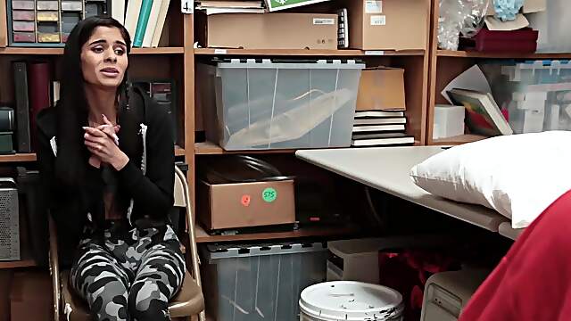 Witness Katya's luscious locks and sultry curves in her seductive cop outfit