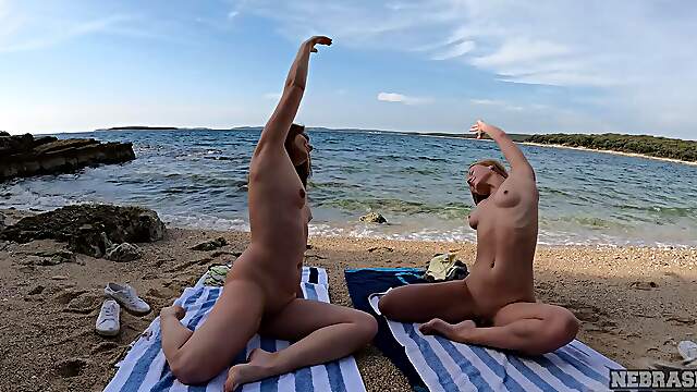 Teen Kristina and sassy MiraD get wild at the beach