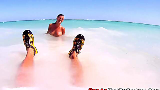 Naughty Amy and studly Nick get kinky on the sandy shore