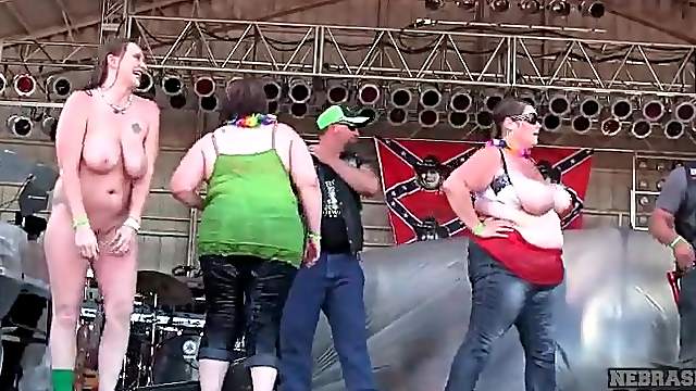 Chubby topless amateurs dancing on concert stage