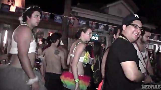 Attend a street party with a pair of bikini girls