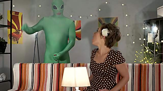 Sweetie rides the man in the green suit for a wild fetish